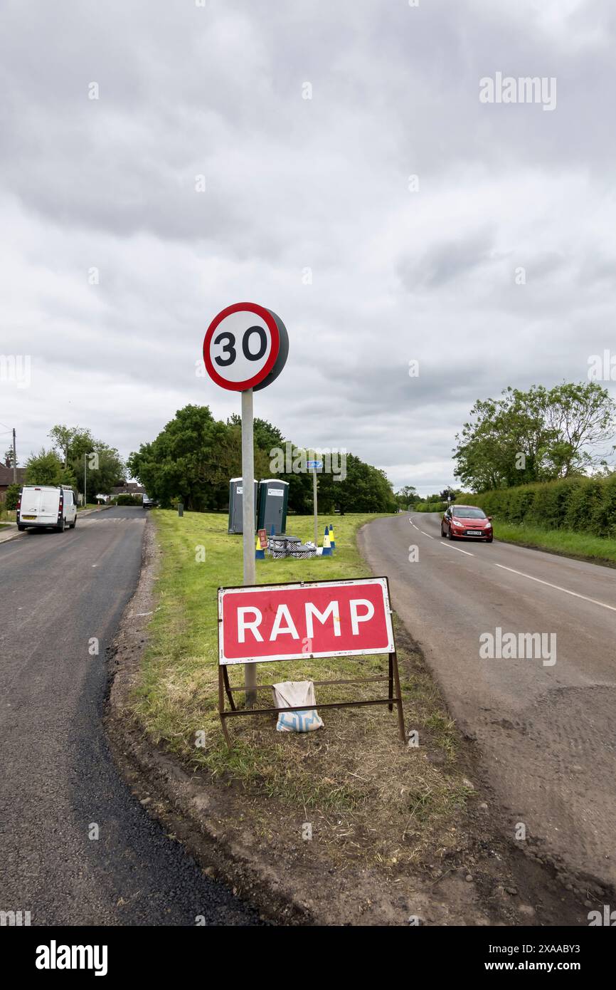 roadworks Ramp warning sign, Fiskerton Road, Cherry Willingham, Lincoln, Lincolnshire, England, UK Stock Photo