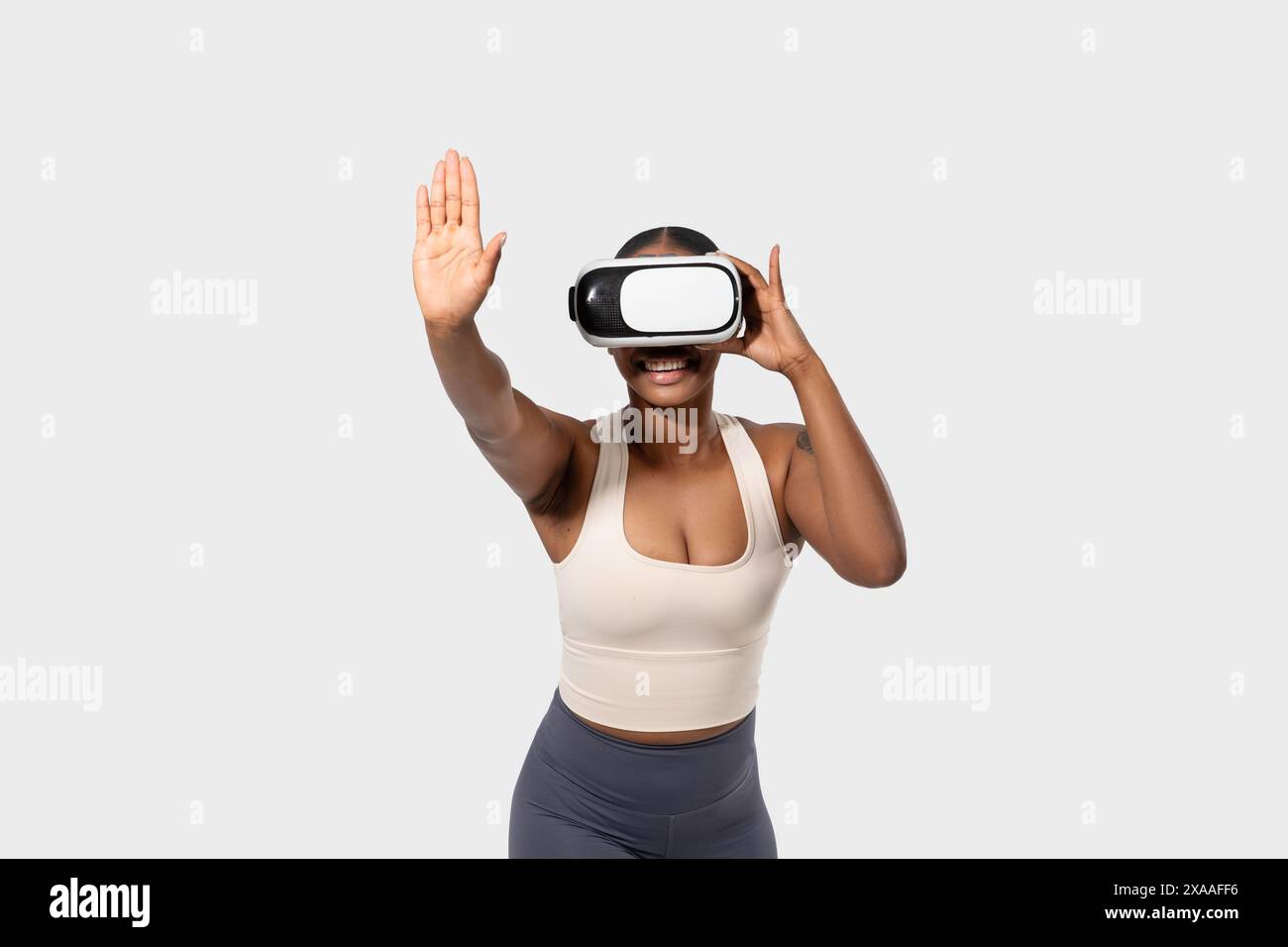 Woman Wearing Virtual Reality Headset Interacting With Digital World ...