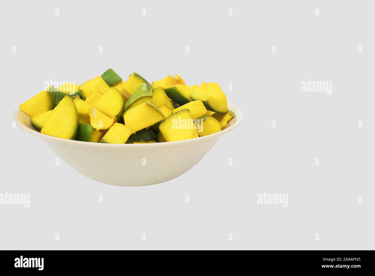 mango slices in white bowl, prepared for making mango pickle Stock ...