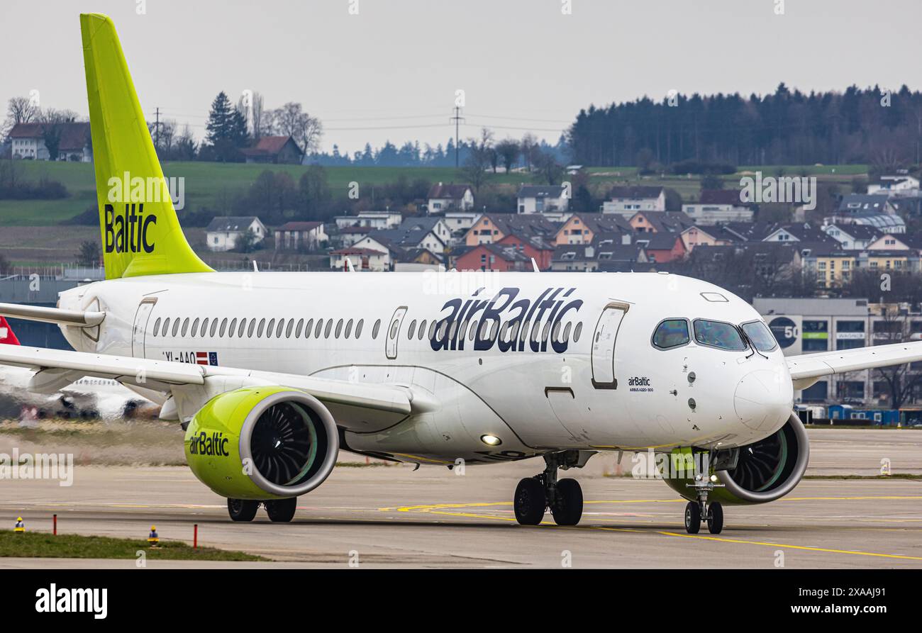 An Air Baltic Airbus A220300 taxis to the runway at Zurich Airport