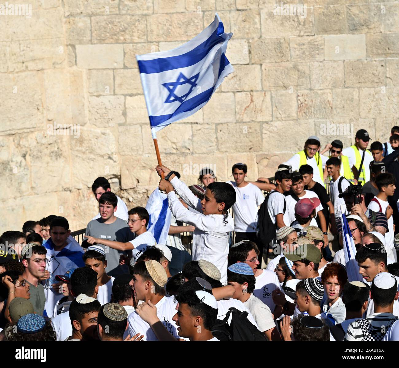 Jerusalem, Israel. 05th June, 2024. An Israeli boy waves the national ...