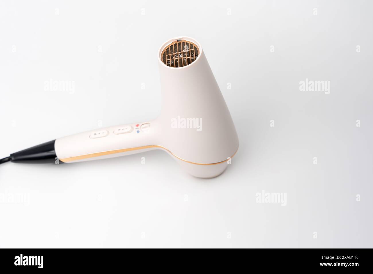 Hair dryer for drying hair on a white background. The buttons are ...