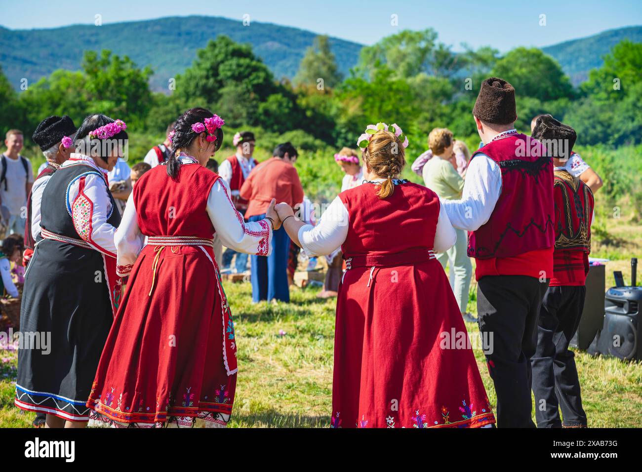 People dancing folk dance. Rose Valley Traditional festival in Bulgaria