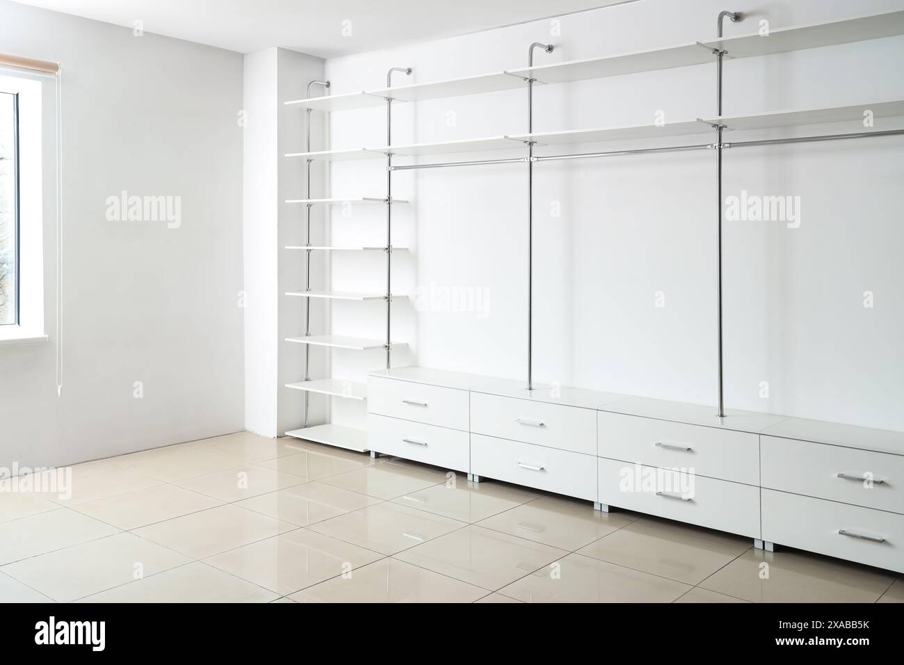 Empty shelves and drawers in modern wardrobe Stock Photo