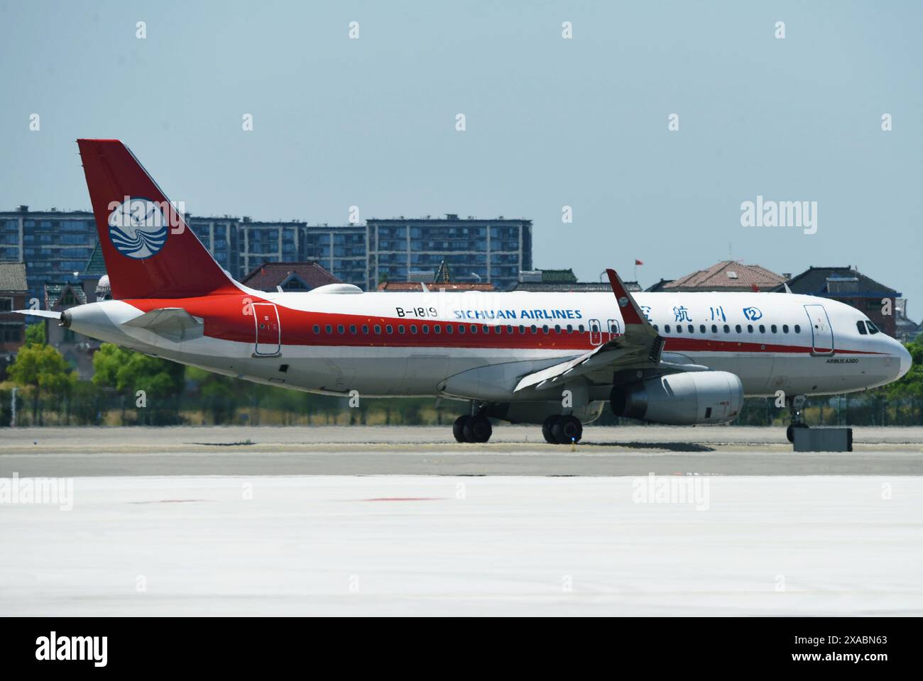 HANGZHOU, CHINA - MAY 16, 2024 - An Airbus 320 of Sichuan Airlines taxies on the runway at Hangzhou Xiaoshan International Airport in Hangzhou, Zhejia Stock Photo