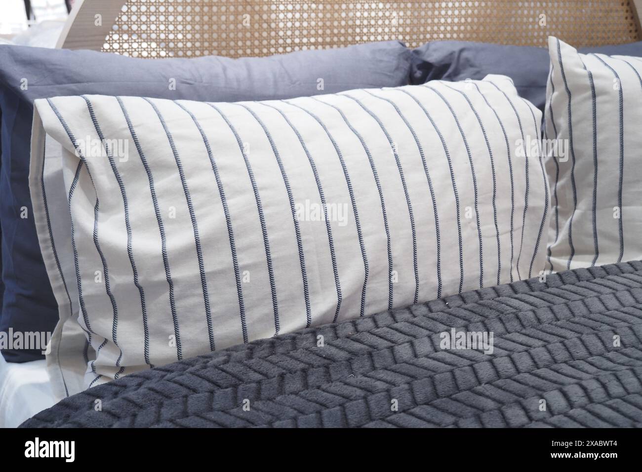 white pillow lined up on bed  Stock Photo