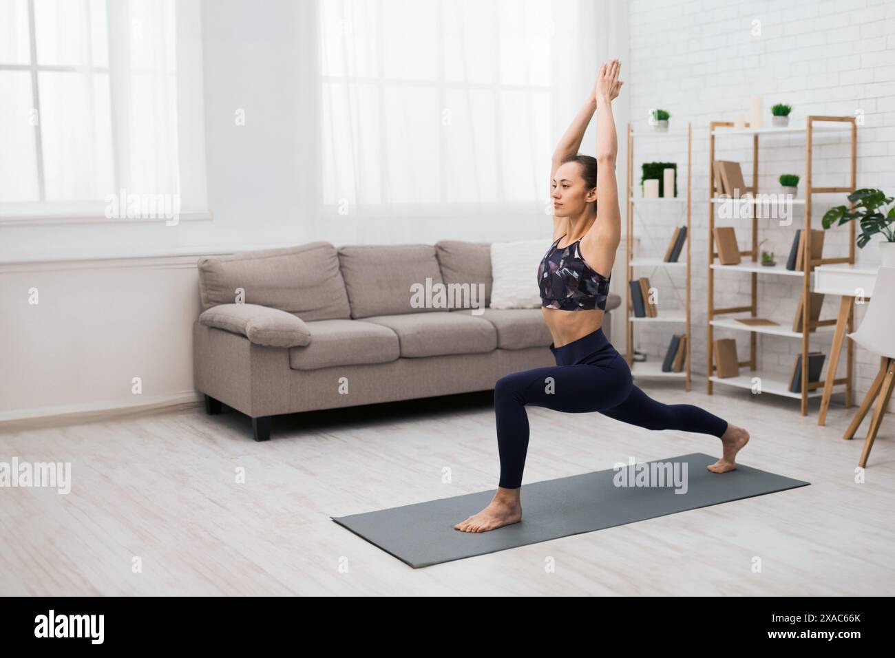 Woman arms overhead in yoga hi-res stock photography and images - Alamy