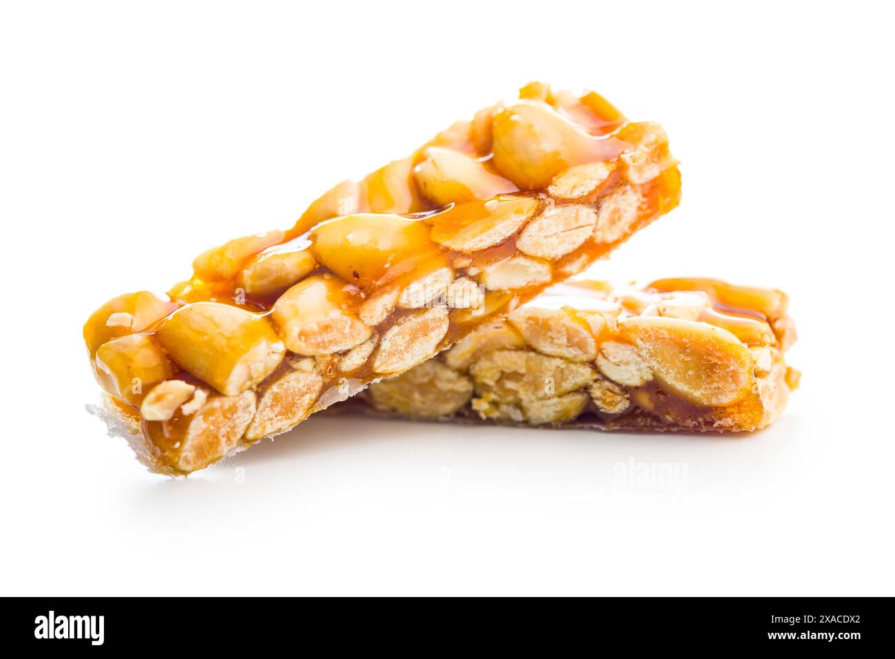 Close Up of almond Brittle Bars With Caramelized Coating isolated on a white background. Stock Photo