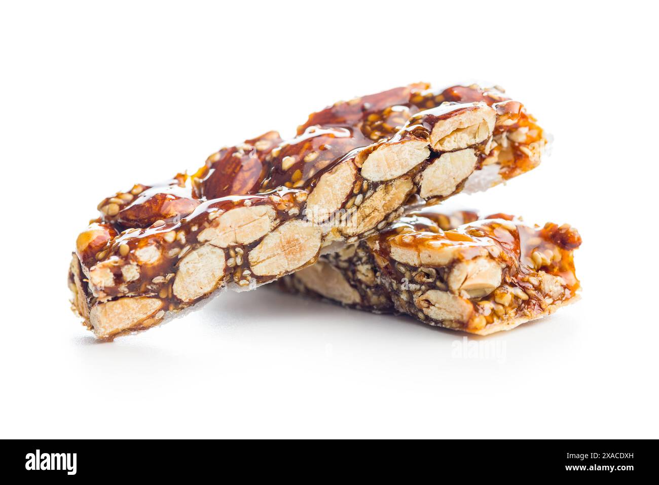 Close Up of almond Brittle Bars With Caramelized Coating isolated on a white background. Stock Photo