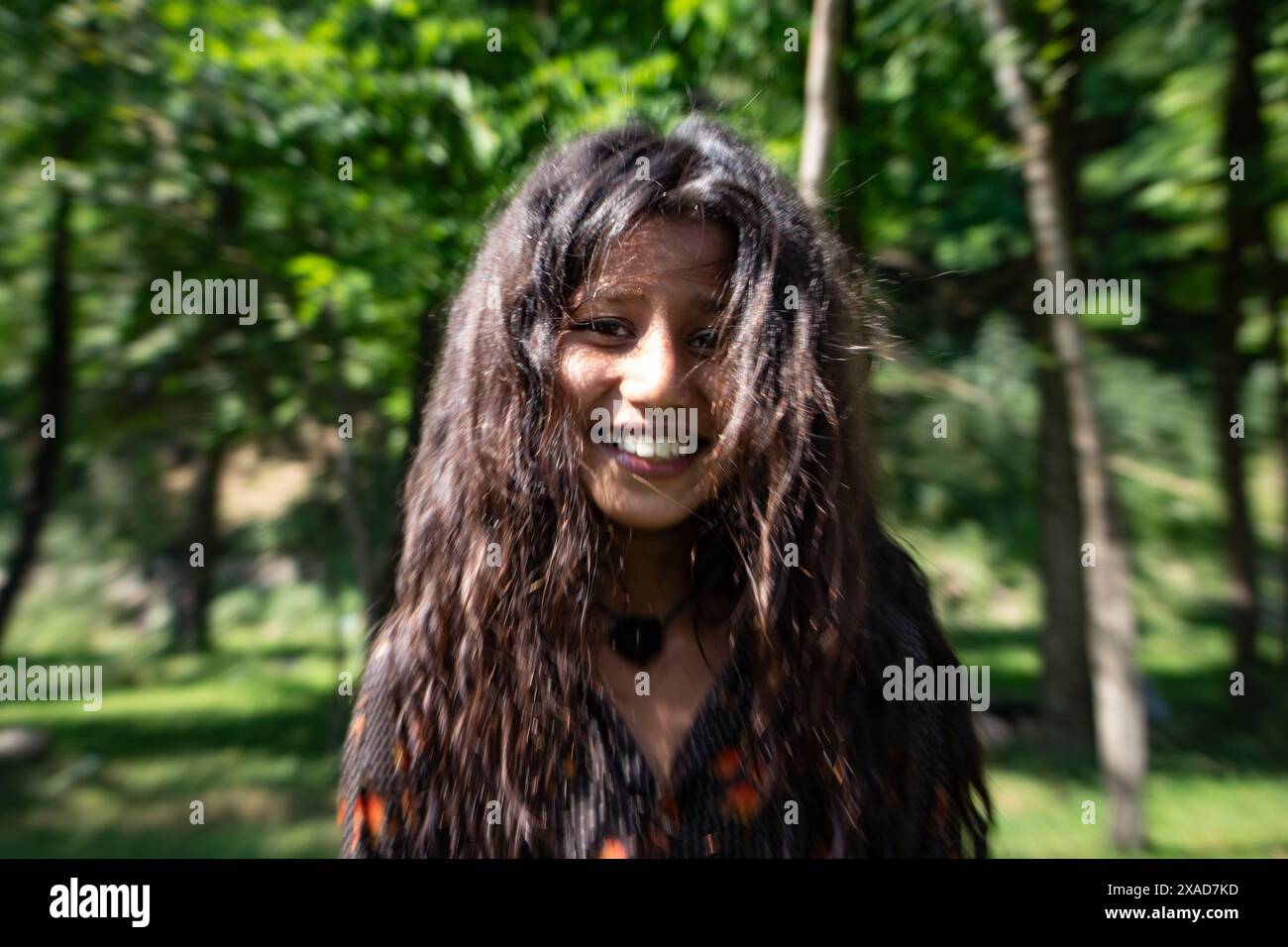 Srinagar, Jammu And Kashmir, India. 6th June, 2024. A nomad girl smiles for a picture on a sunny day on the outskirts of Srinagar. (Credit Image: © Adil Abass/ZUMA Press Wire) EDITORIAL USAGE ONLY! Not for Commercial USAGE! Stock Photo