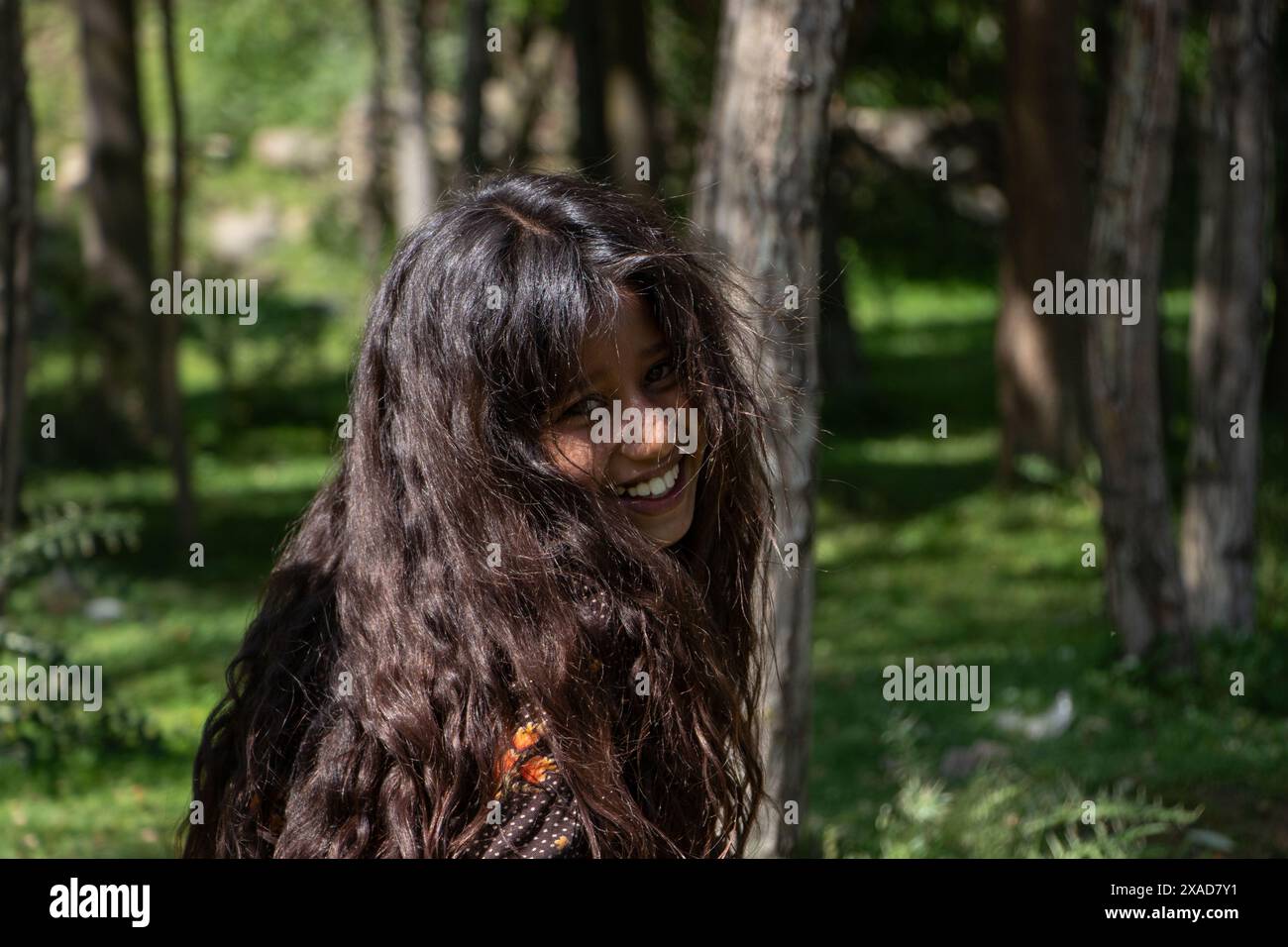 Srinagar, Jammu And Kashmir, India. 6th June, 2024. A nomad girl smiles for a picture on a sunny day on the outskirts of Srinagar. (Credit Image: © Adil Abass/ZUMA Press Wire) EDITORIAL USAGE ONLY! Not for Commercial USAGE! Stock Photo