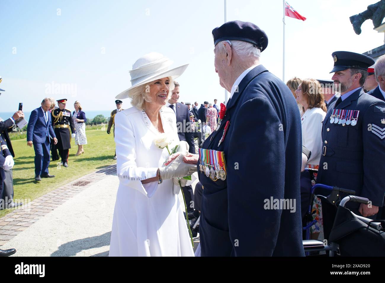 Queen Camilla speaks to D-Day veteran Henry Rice, 98, from Surrey ...