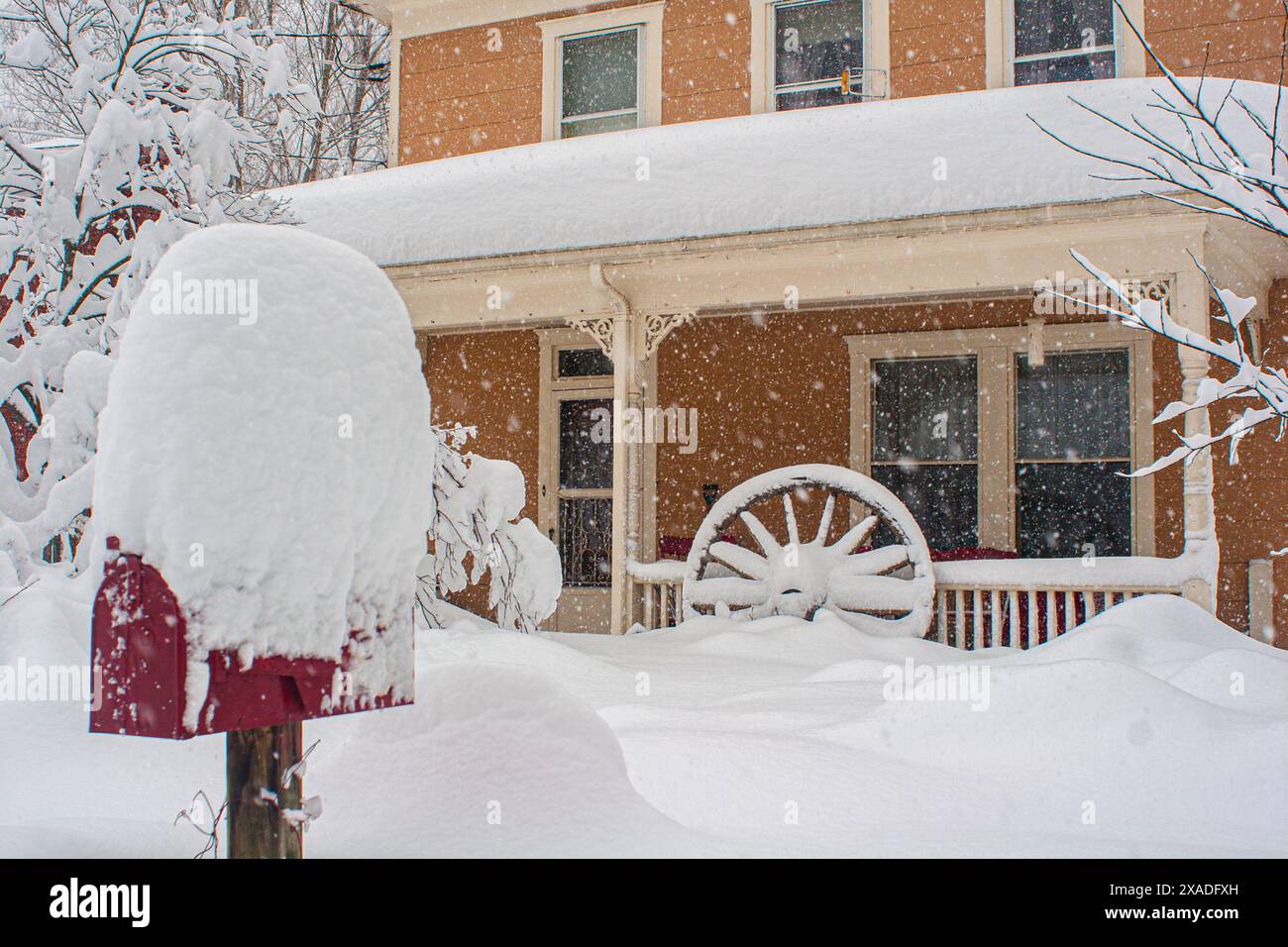 A snow-covered House and Mailbox near Washington, DC, during the winter snowstorm of 2010. Stock Photo