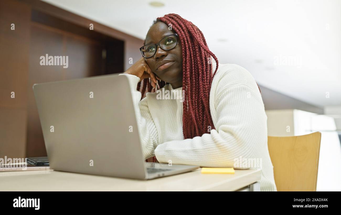 Woman wearing glasses braids hi-res stock photography and images - Alamy