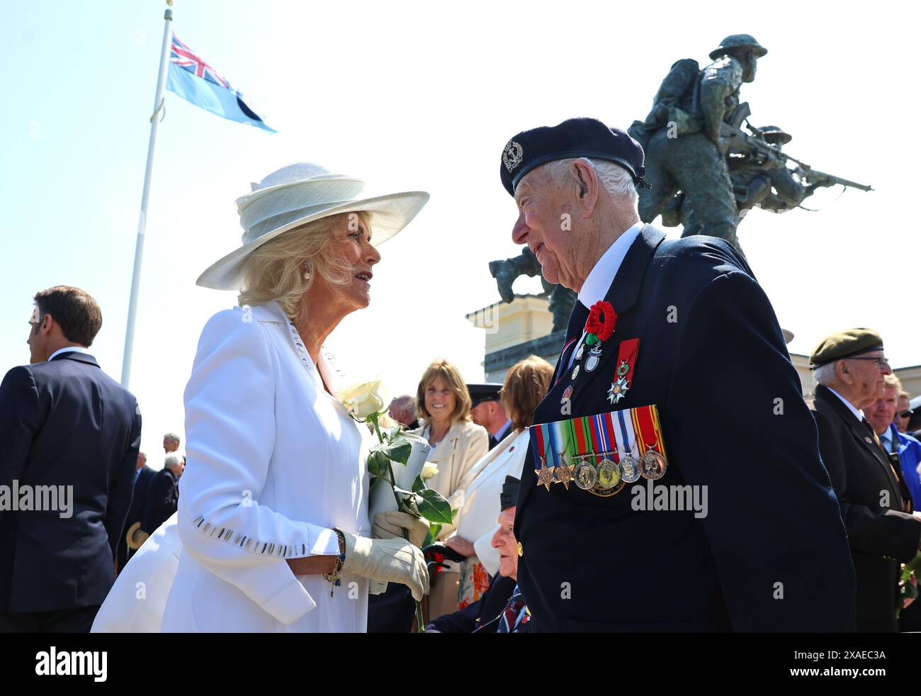 Queen Camilla meets D-Day veteran Henry Rice following the UK national commemorative event for the 80th anniversary of D-Day, in Ver-sur-Mer, Normandy, France. Picture date: Thursday June 6, 2024. Stock Photo