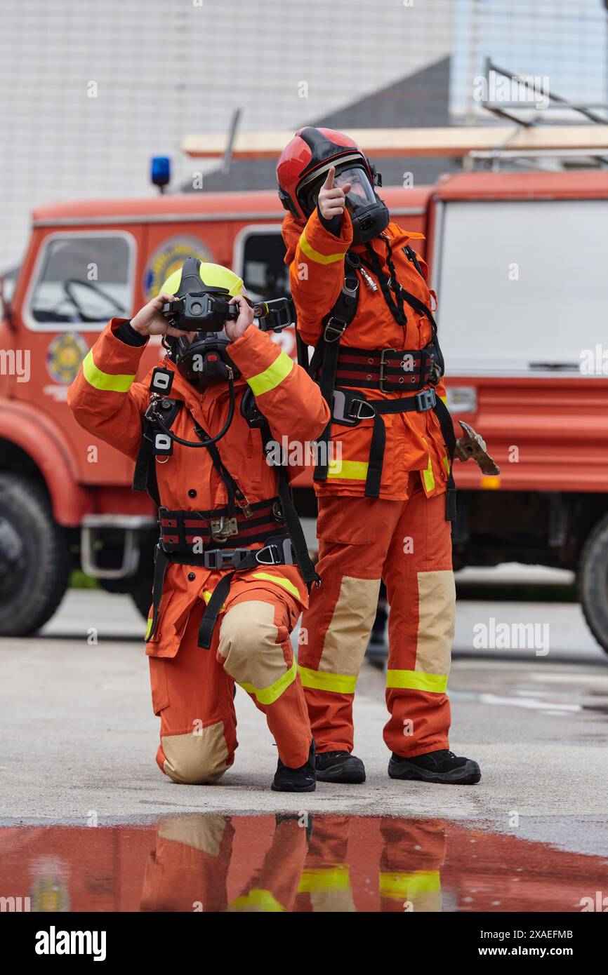Firefighter Team Learning Thermal Camera Usage During Training Session Stock Photo - Alamy
