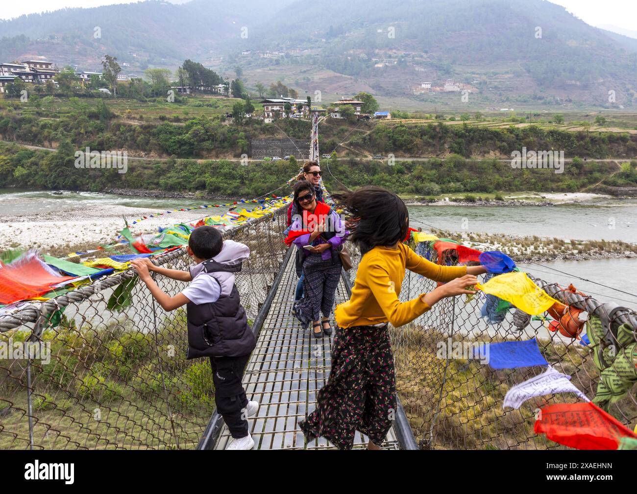 Punakha Suspension Bridge with prayer flags, Punakha dzongkhag, Punakha, Bhutan Stock Photo