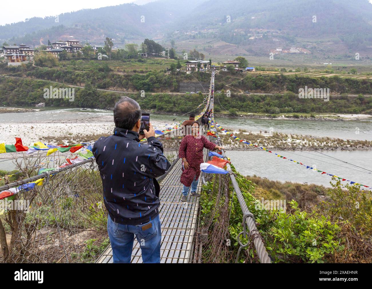 Punakha Suspension Bridge with prayer flags, Punakha dzongkhag, Punakha, Bhutan Stock Photo