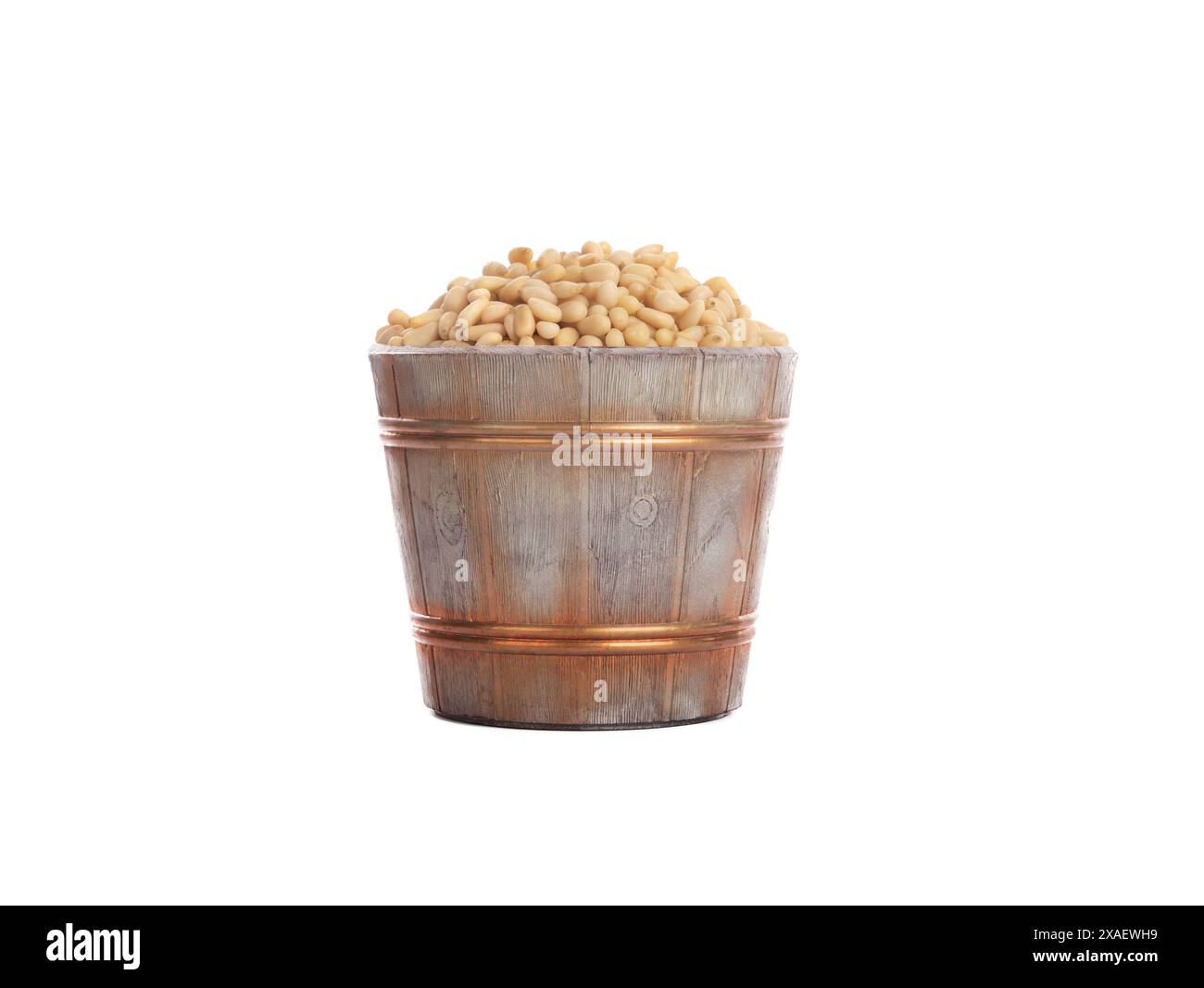 festive bucket with pine nuts isolated on white background Stock Photo