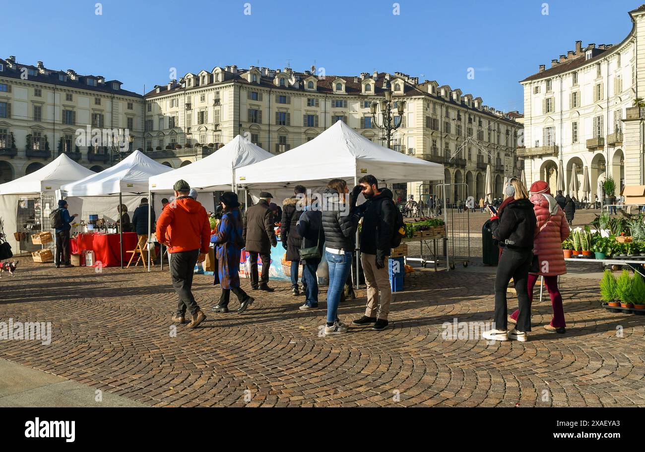 People shopping at Agriflor, the monthly street market dedicated to the world of green and food in Piazza Vittorio Veneto, Turin, Piedmont, Italy Stock Photo
