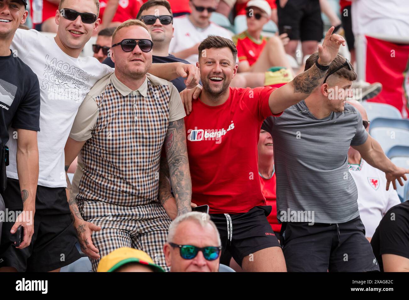 ALGARVE, PORTUGAL - 06 JUNE 2024: Welsh fans during the international friendly fixture between Gibraltar & Cymru at the Estadio Algarve in Portugal on 6th June. (Pic by John Smith/FAW) Stock Photo