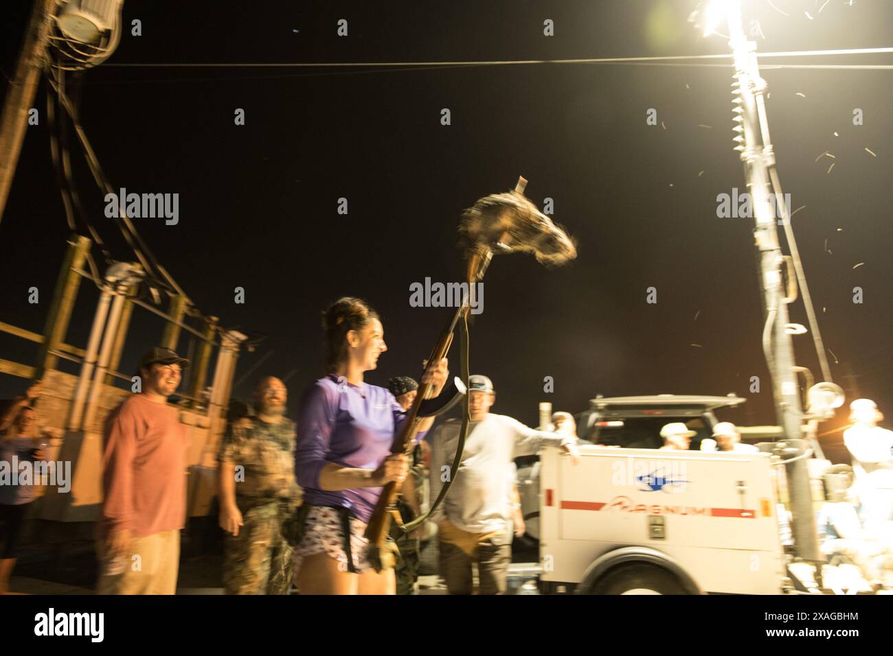 Rodent Rodeo Armed nutria hunters proudly display their rifles at the annual Nutria ...