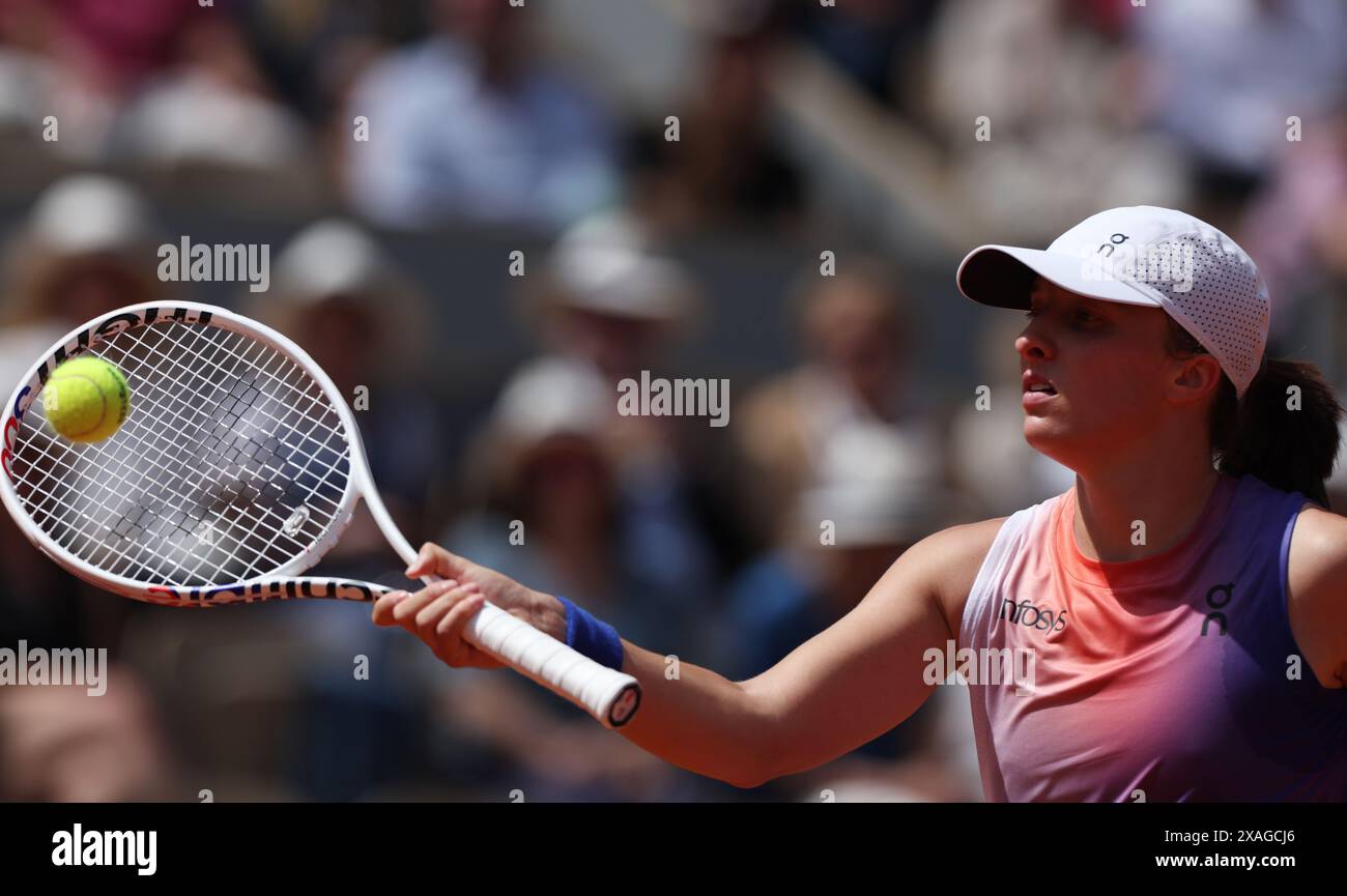 Paris, France. 6th June, 2024. Iga Swiatek returns a shot during the women's singles semifinal match between Coco Gauff of the United States and Iga Swiatek of Poland at the French Open tennis tournament at Roland Garros in Paris, France, on June 6, 2024. Credit: Gao Jing/Xinhua/Alamy Live News Stock Photo