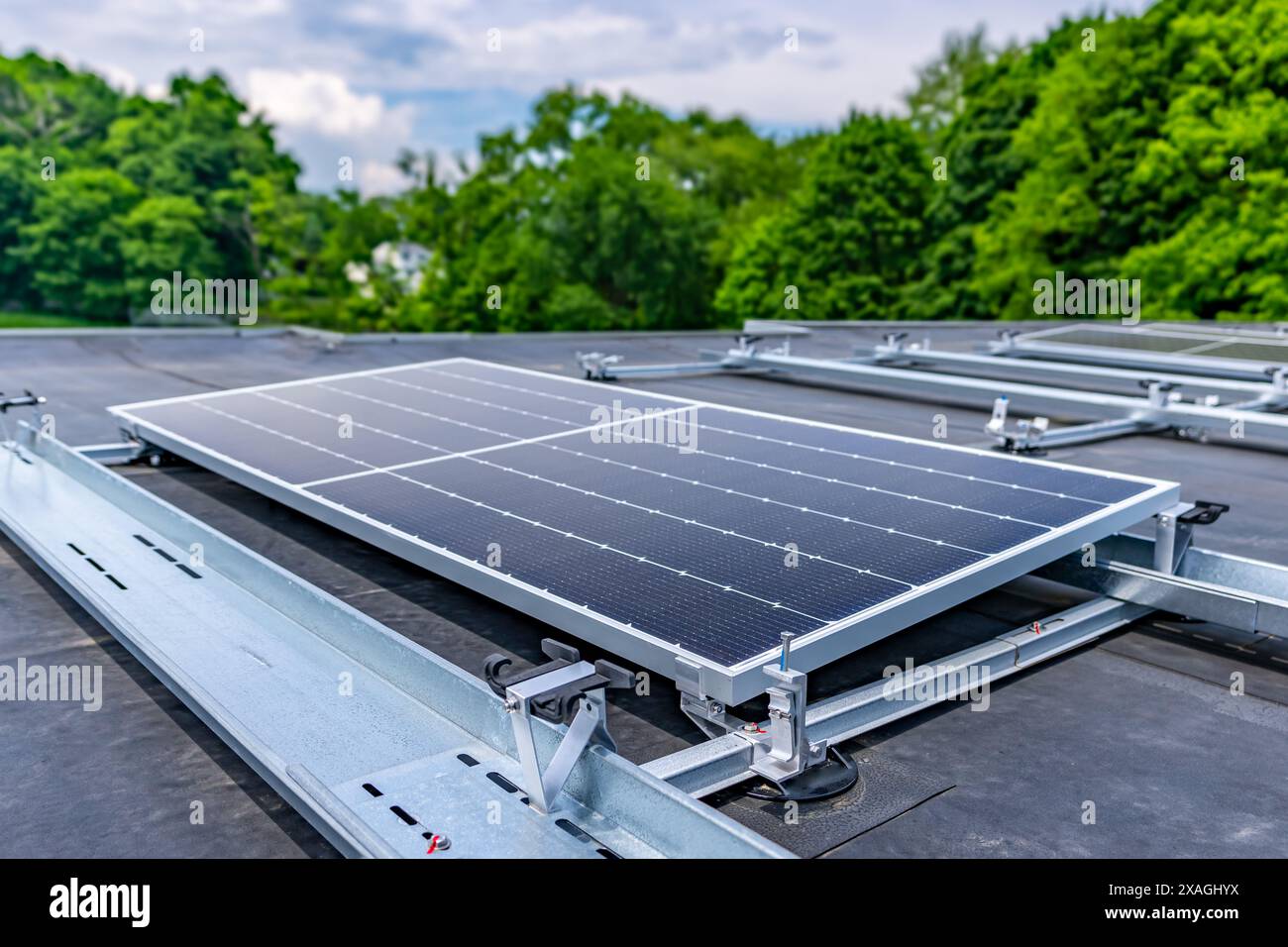 Photo solar panels install on a flat commercial, industrial EPDM roof