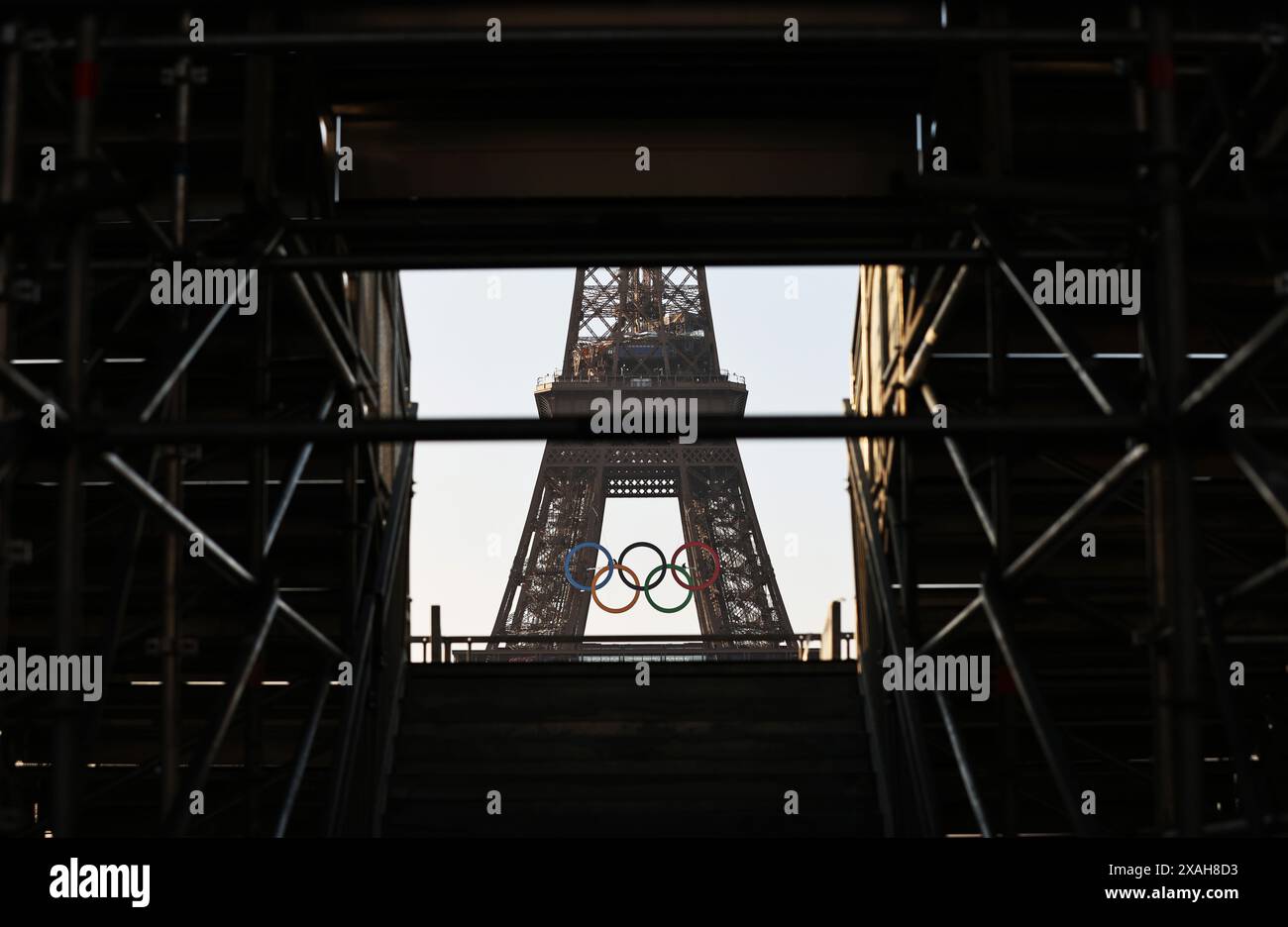 Paris, France. 7th June, 2024. The Olympic rings are seen on the Eiffel Tower, in Paris, France, on June 7, 2024. The Olympics rings are unveiled on the Eiffel Tower early in the morning of Friday as the French capital marks 50 days until the start of the upcoming Paris 2024 Olympic Games. Credit: Gao Jing/Xinhua/Alamy Live News Stock Photo