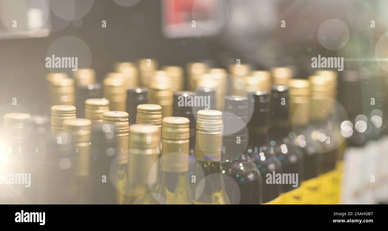 Image of bokeh over wine bottles at shop Stock Photo