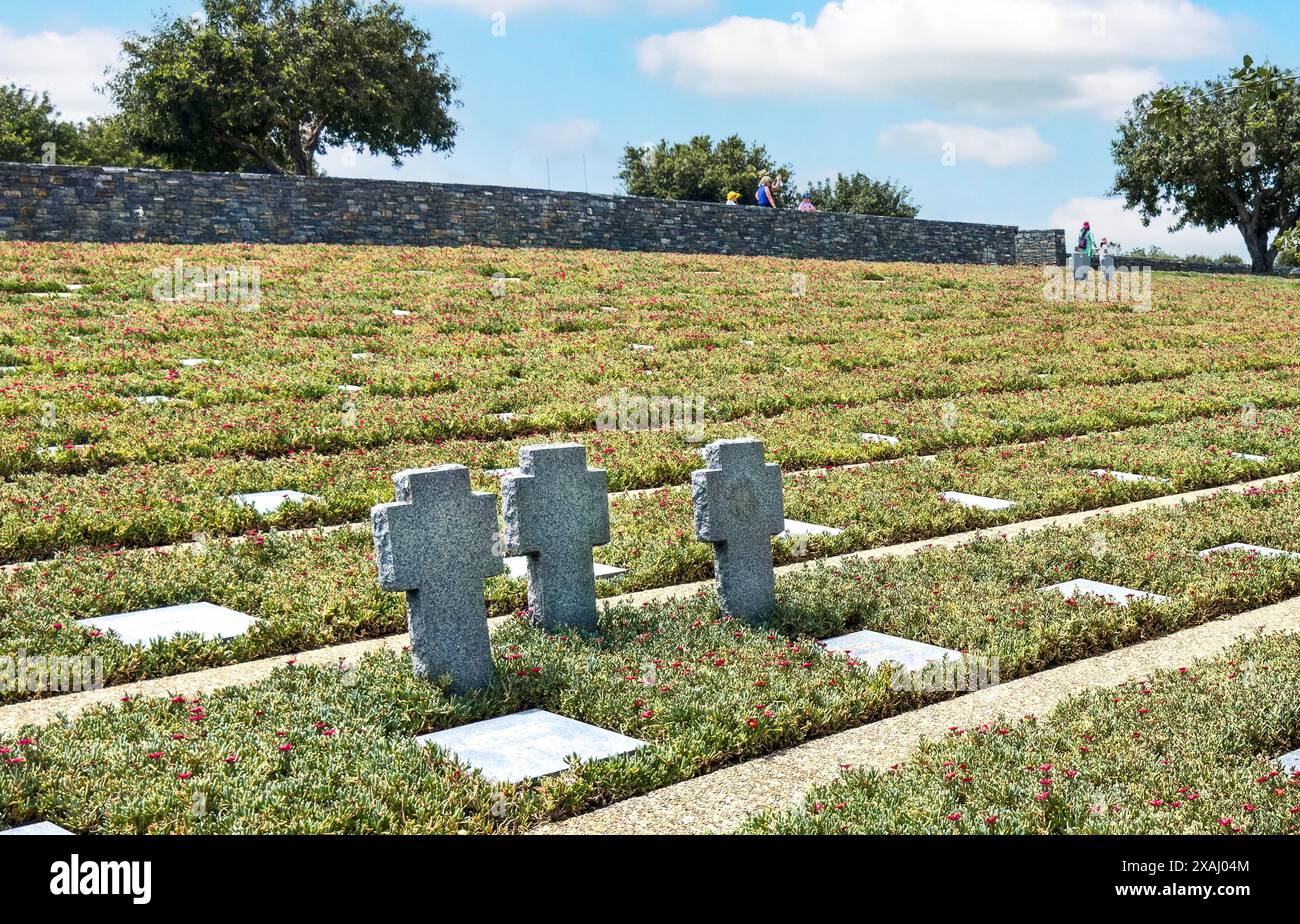 Three stone crosses between rows of grave slabs Gravestones Graves ...