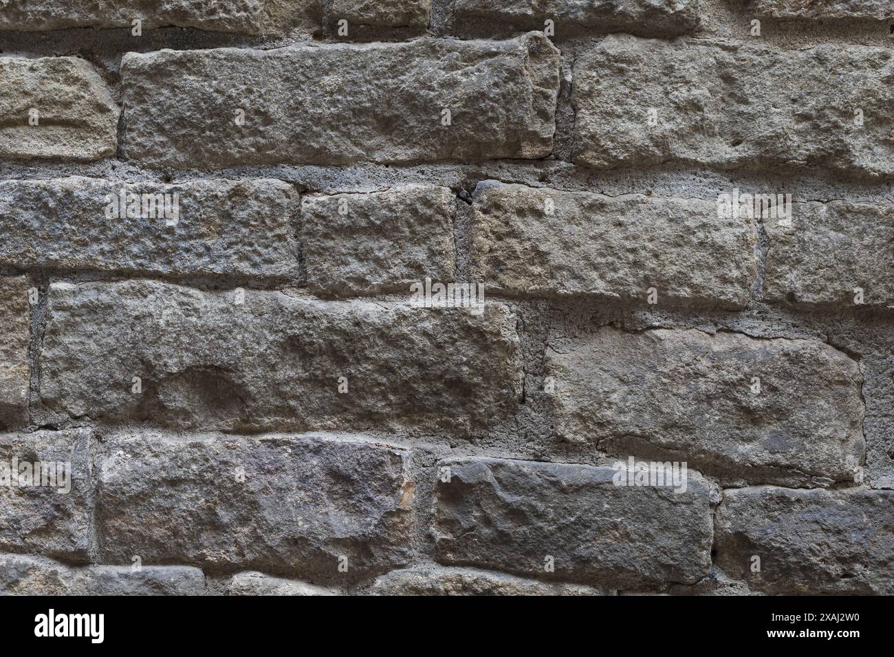 close-up flat photography of an old grey stone brick wall surface ...