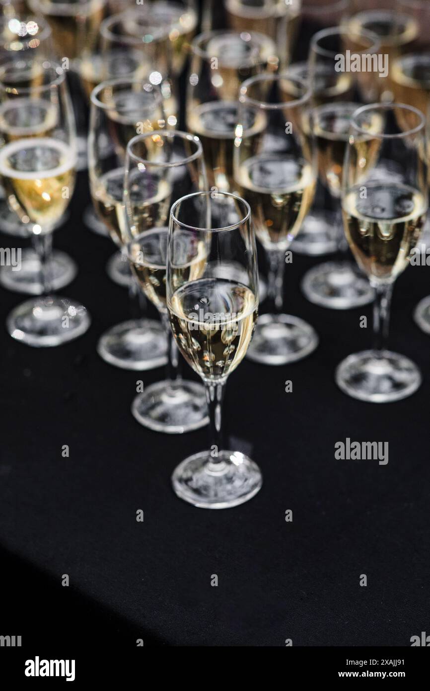 Close-up of Champagne Flutes at Elegant Event Stock Photo