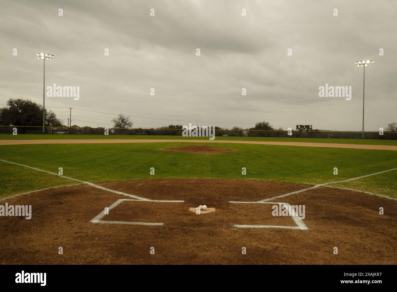 Wide Angle Baseball Field from Home Plate with Stadium lights Stock
