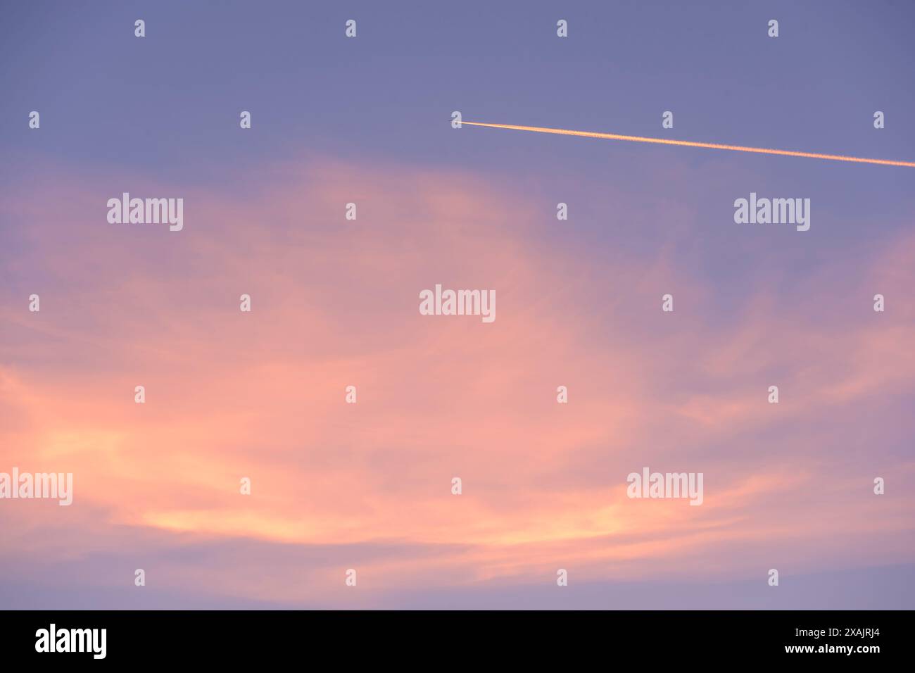 Airplane with contrails hi-res stock photography and images - Alamy