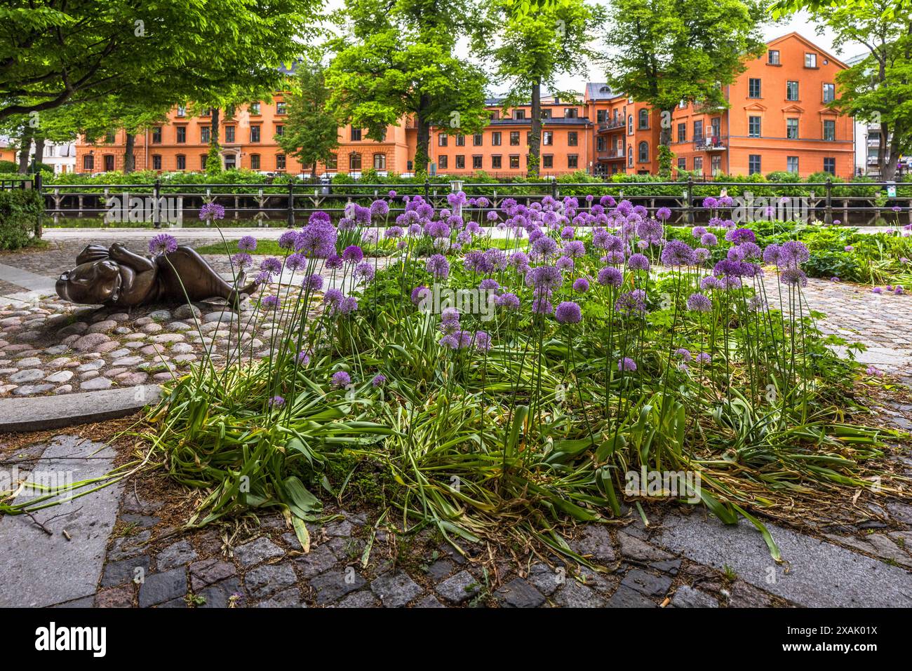 Swedish Creativity Object Green spaces with benches, art objects and flower beds by the river ...