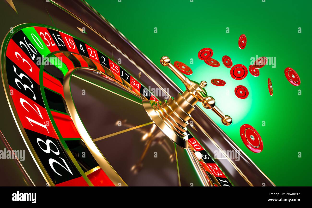 Classic casino roulette wheel spinning with red chips green background Stock Photo