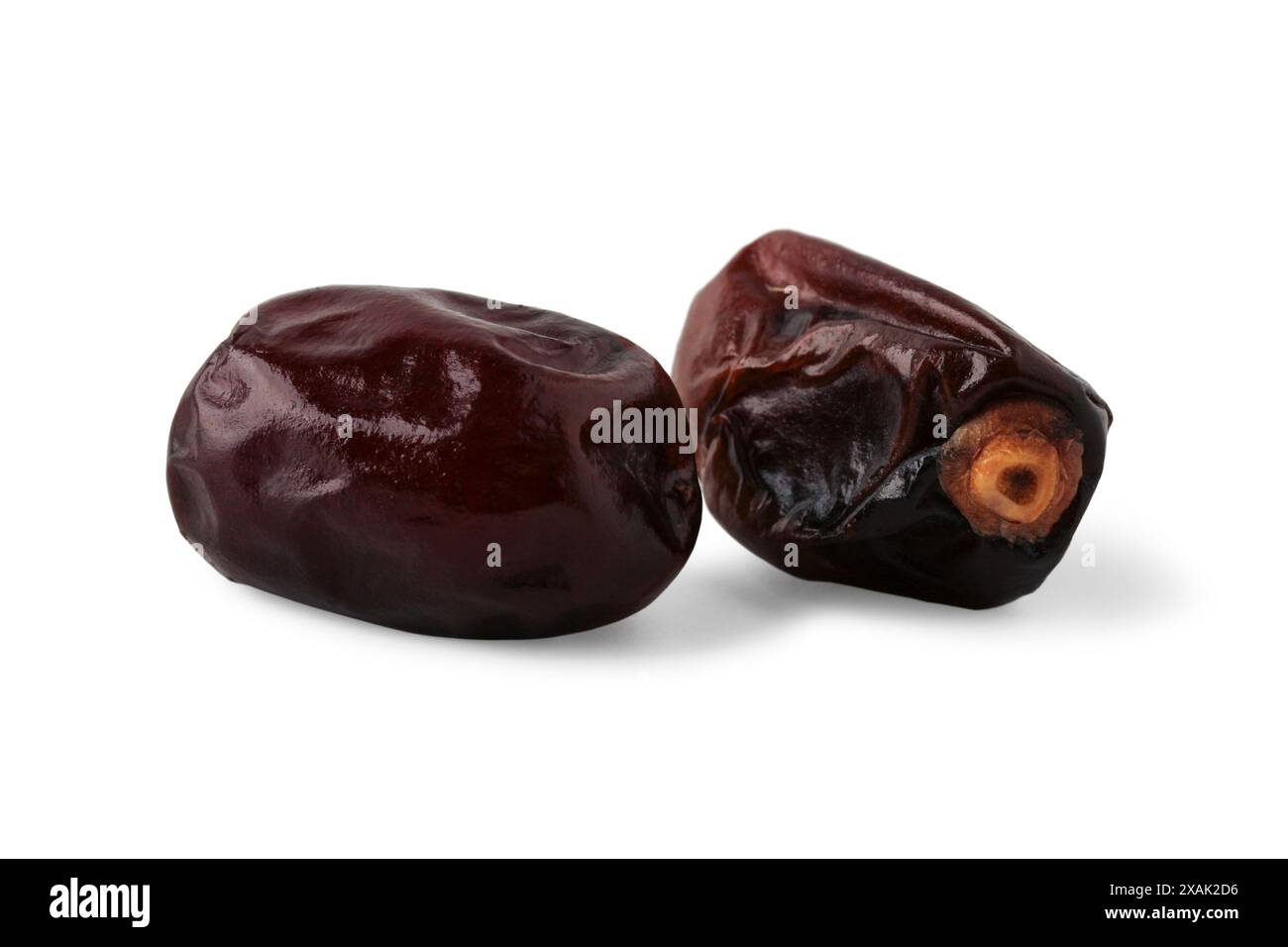Dried dates close up isolated on white background Stock Photo
