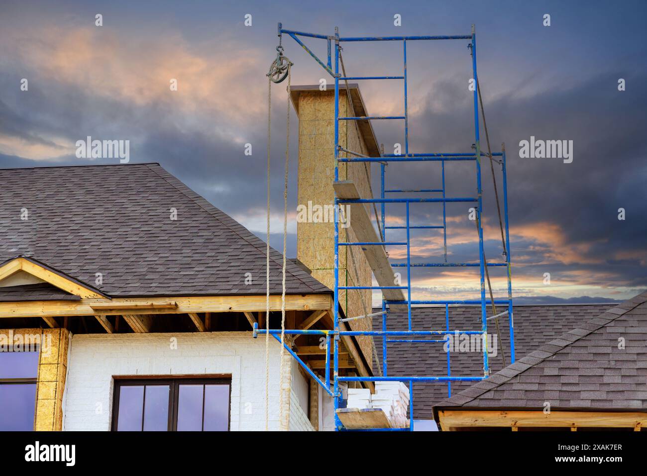 House under construction joist framework with featuring plywood is
