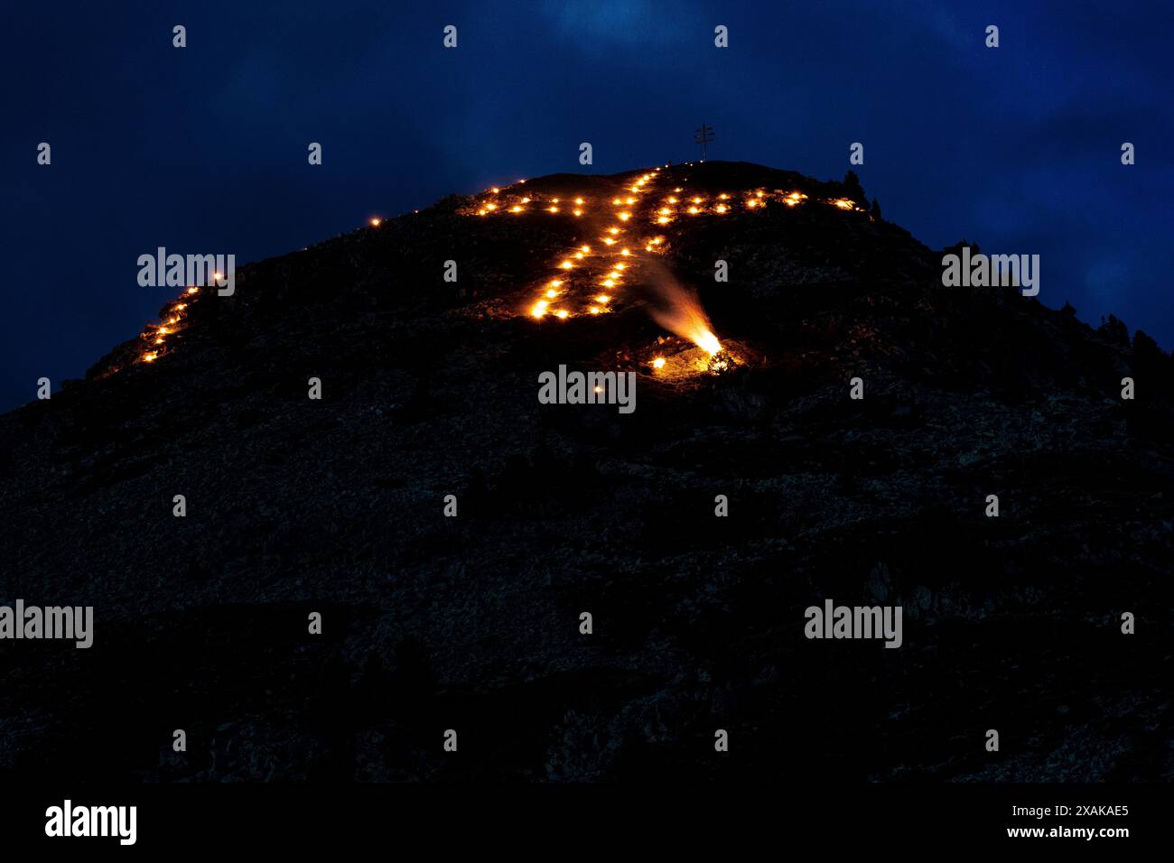 Europe, Austria, Tyrol, Ötztal Alps, Ötztal, Oetz, Sacred Heart Fire in Ötztal Stock Photo