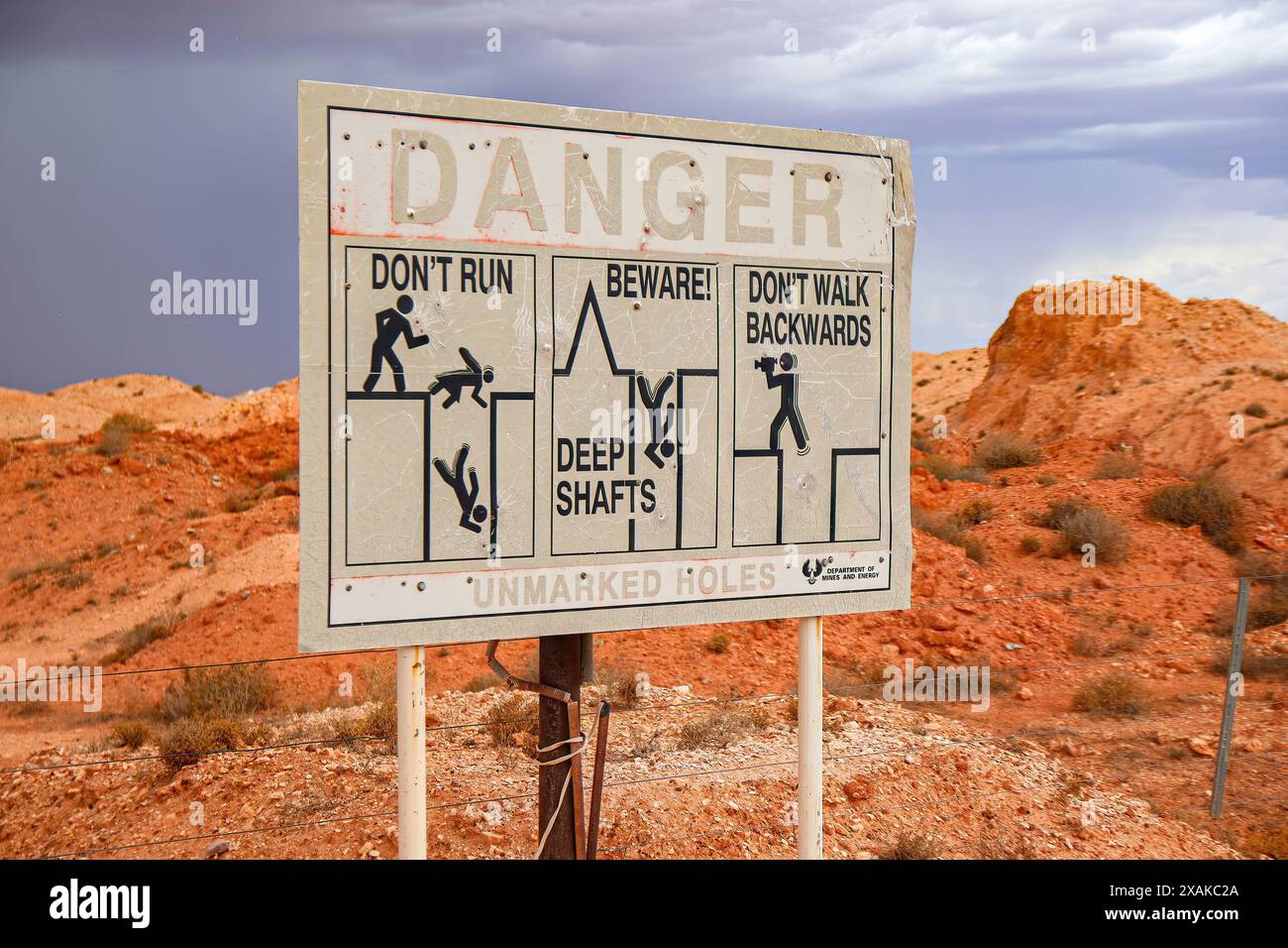 Danger sign outside Tom's Working Opal Mine in Coober Pedy, South