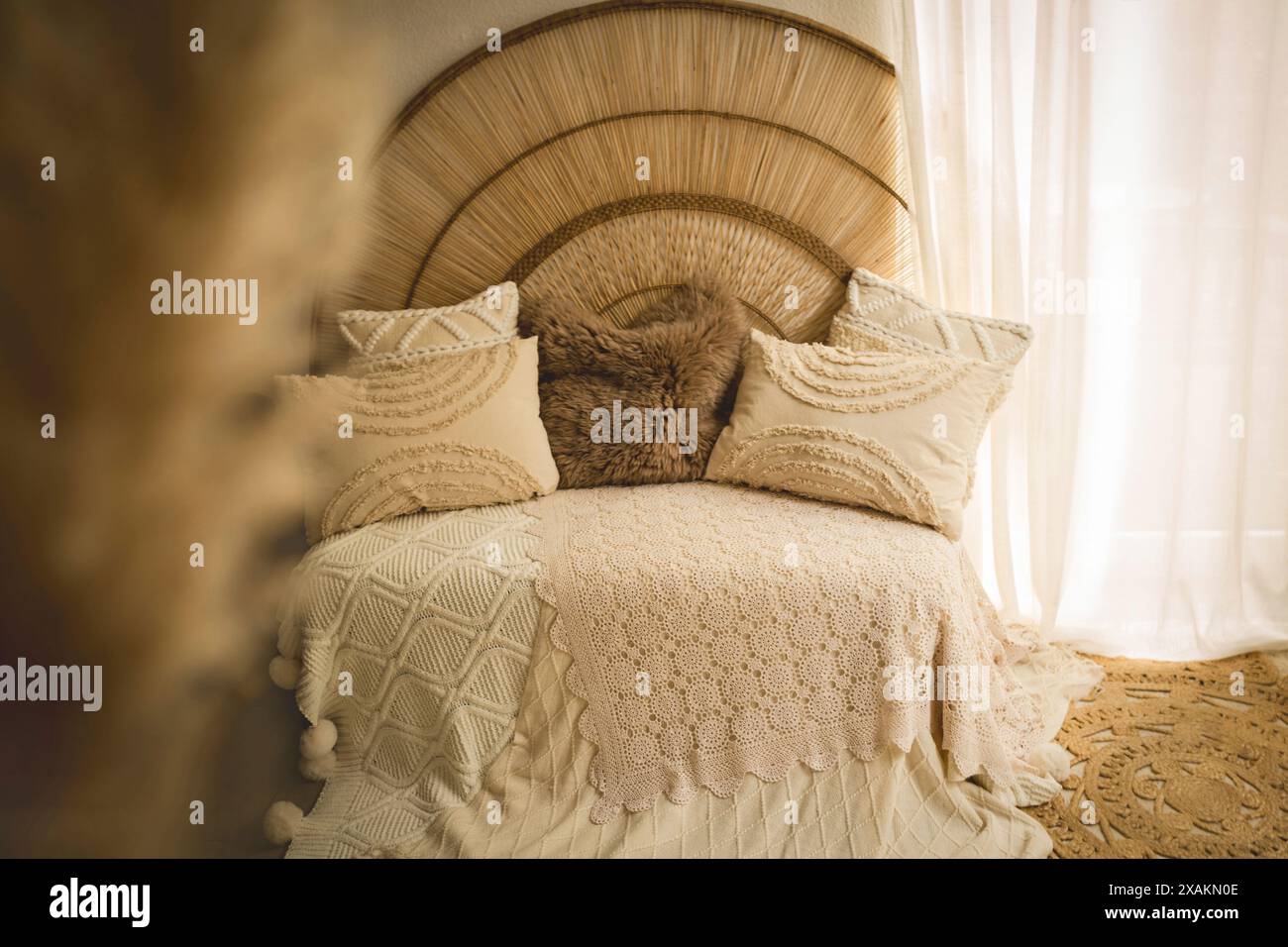 A boho-style bed Stock Photo - Alamy
