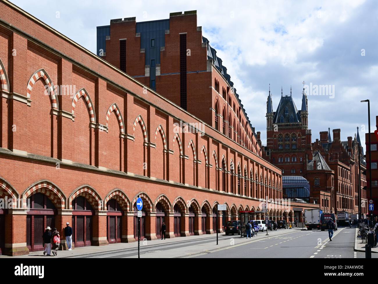 The red brick western facade and ornate architecture of St Pancras railway station, Midland Road, London, England, UK Stock Photo