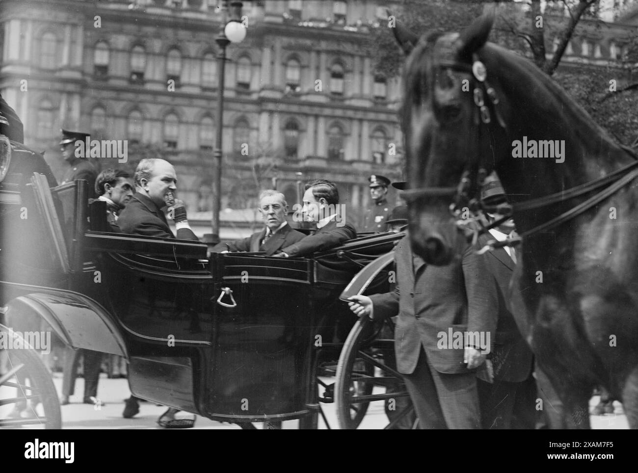 Wilson [and] Mitchel at Funeral , Vera Cruz victims, Tumulty, 1914. Shows President Woodrow Wilson with Mayor John Purroy Mitchel (1879-1918) and his secretary Joseph Patrick Tumulty in New York City, during the procession before the National Memorial Service on May 11, 1914 in honor of the seamen and marines who were killed in Veracruz, Mexico during the Mexican Revolution. Stock Photo