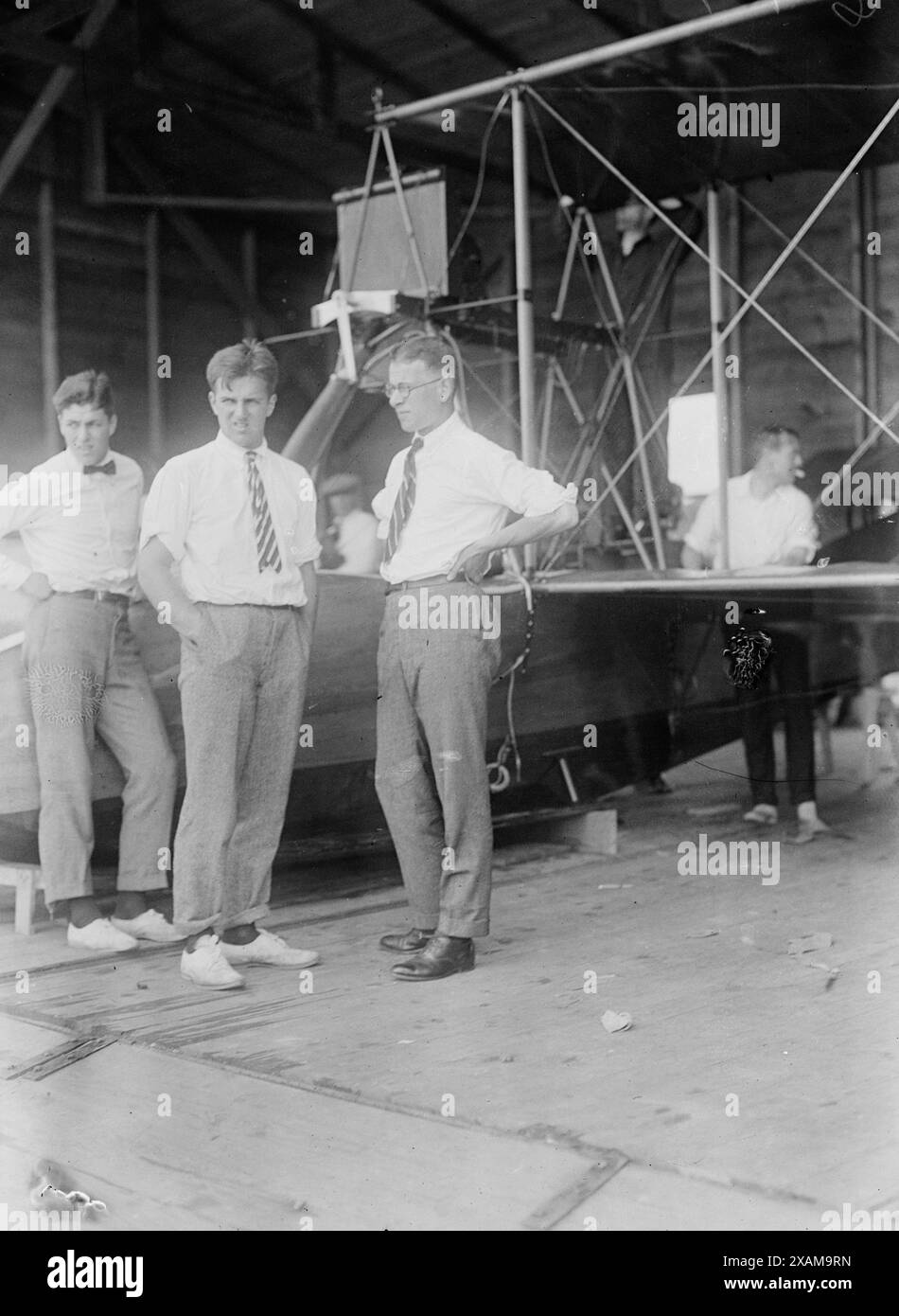 Erl Clinton Barker Gould, Frederick Trubee Davison, Artemus Lamb Gates, [1916?]. Shows Erl Clinton Barker Gould, Frederick Trubee Davison, Artemus Lamb Gates and others who went to train at the aviation school at Port Washington, Long Island, New York, in order to become a unit of the Aerial Coast Patrol. Stock Photo