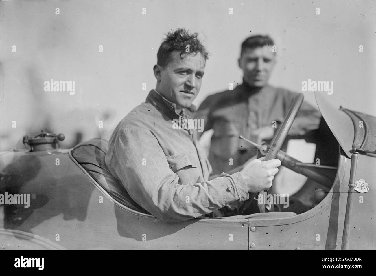 Dario Resta, between c1915 and c1920. Shows race car driver Dario Resta (1882-1924) in his 1914 Peugot L45 racing car. Stock Photo