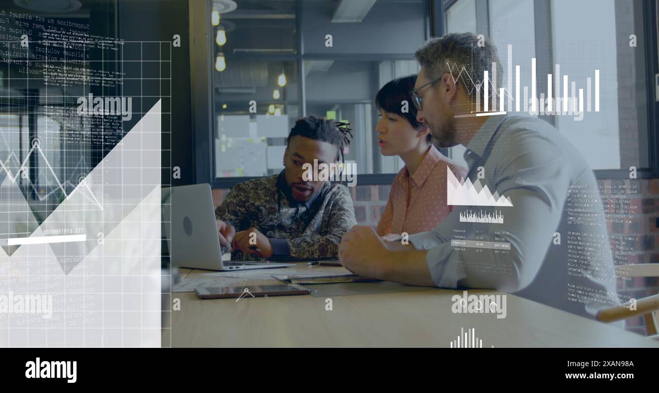 Image of financial data processing over diverse business people working in office Stock Photo