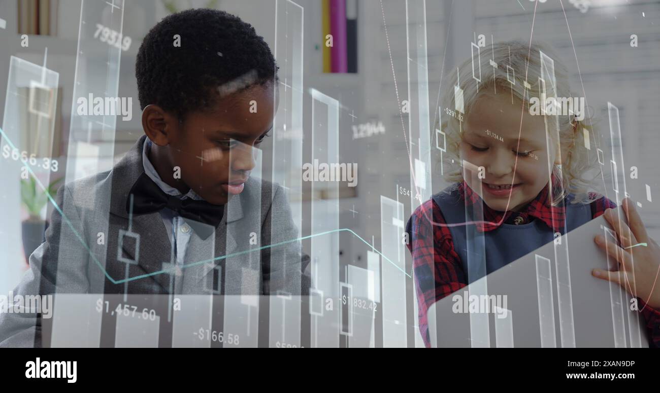 Image of financial data processing over diverse children using laptops ...