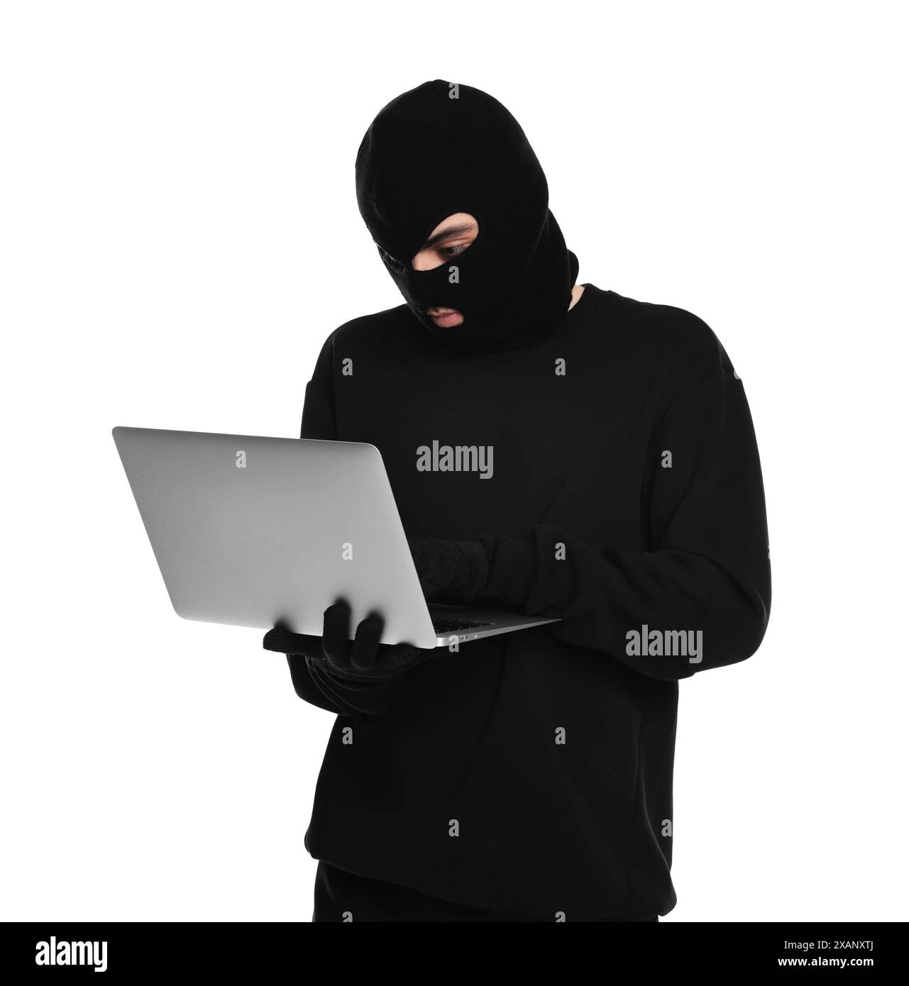 Thief in balaclava with laptop on white background Stock Photo - Alamy