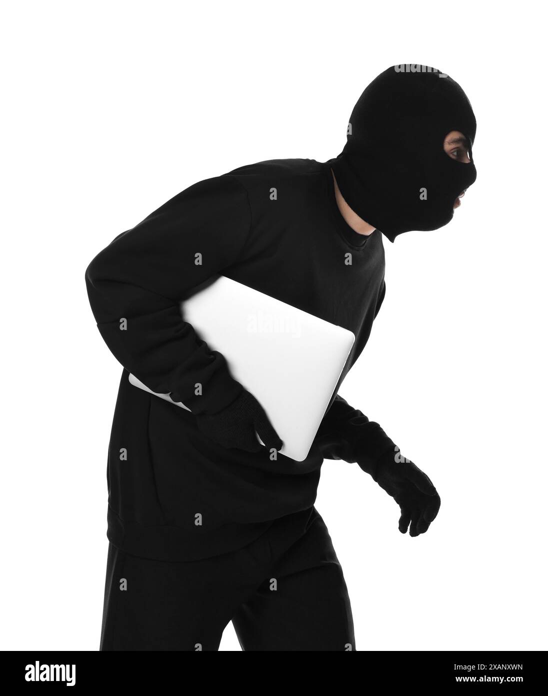 Thief in balaclava with laptop on white background Stock Photo - Alamy